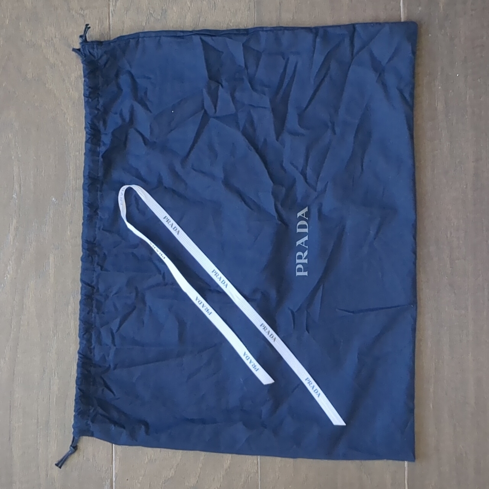 Prada blue dust bag with ribbon
